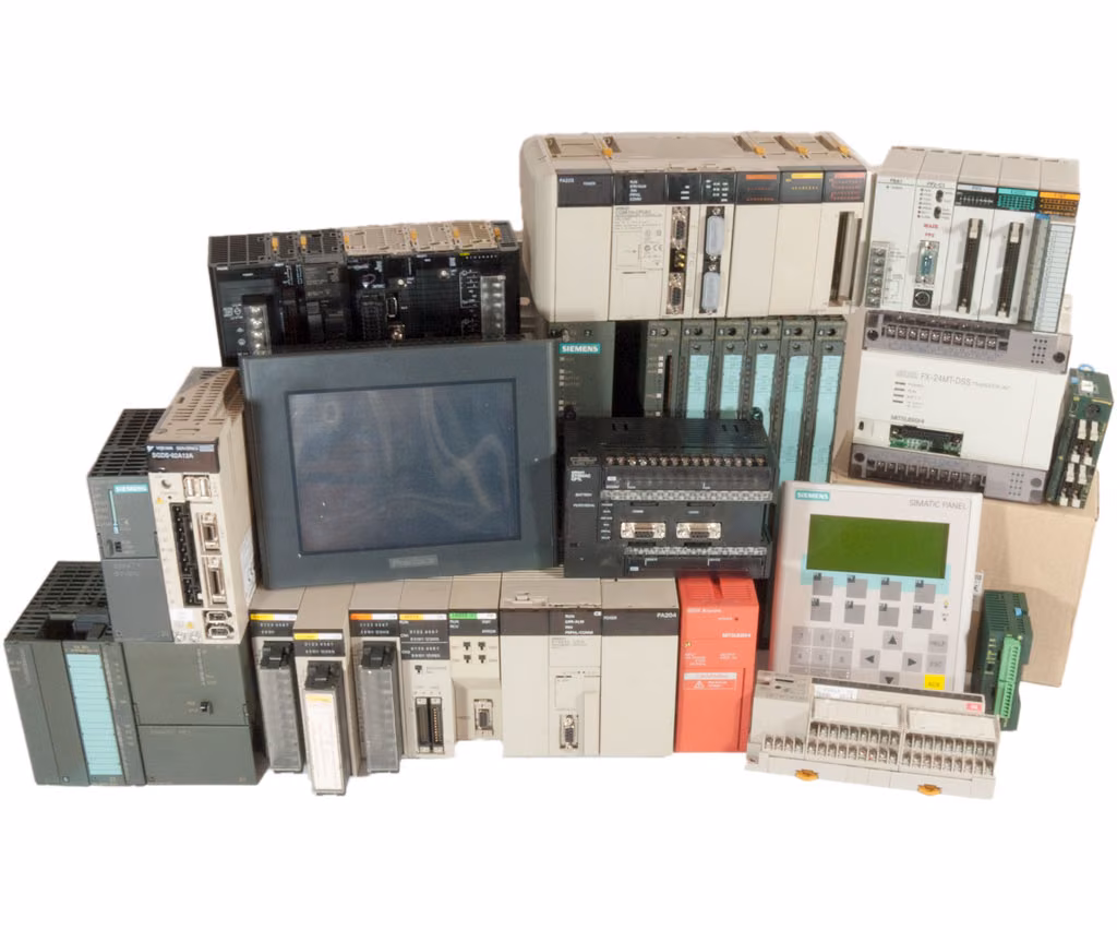 Assortment of PLCs, HMI panels and I/O modules from Siemens, Omron and Mitsubishi